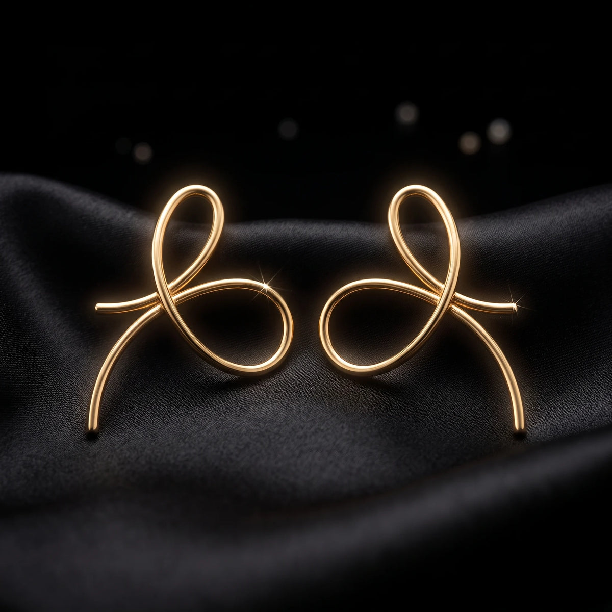Luxora Eternal Bow Sculptural Earrings